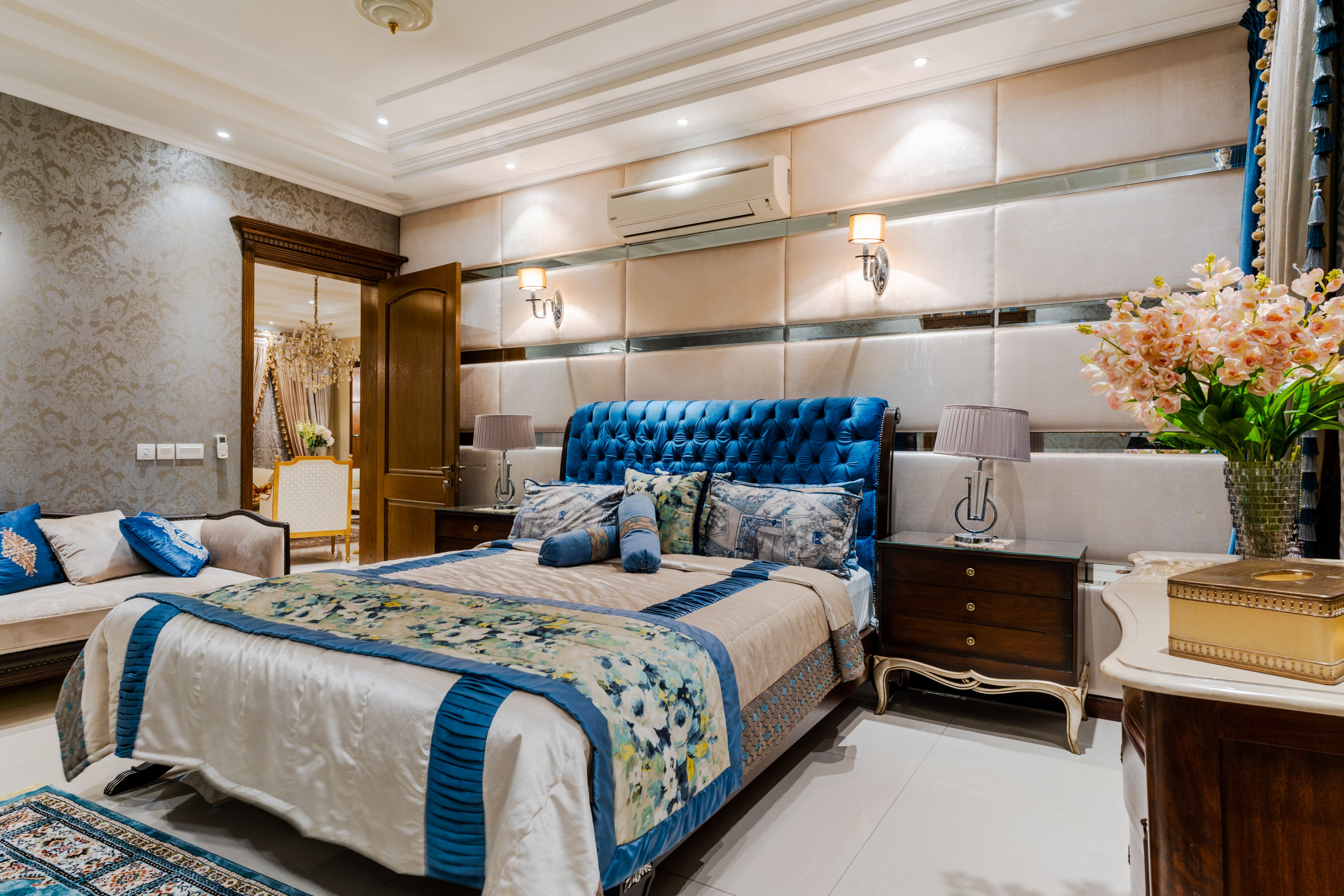 modern bedroom setup that look expensive Elegant and luxurious bedroom interior featuring plush bedding and ornate decor.