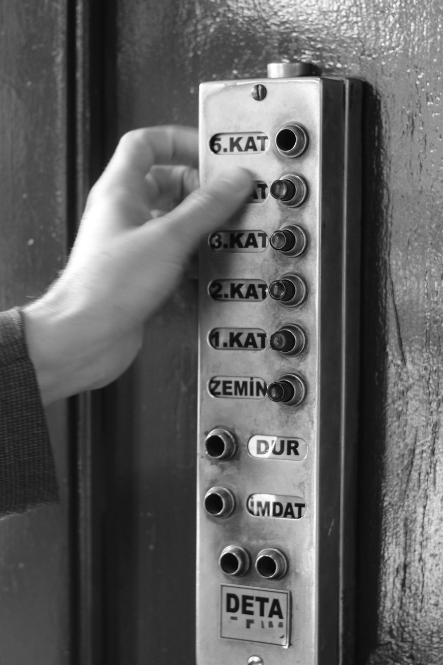 Elevator accessibility push buttons with tactile symbols and Braille
