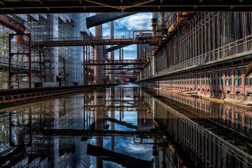 Free A dramatic industrial scene with reflections at Zollverein, Essen, Germany. Stock Photo