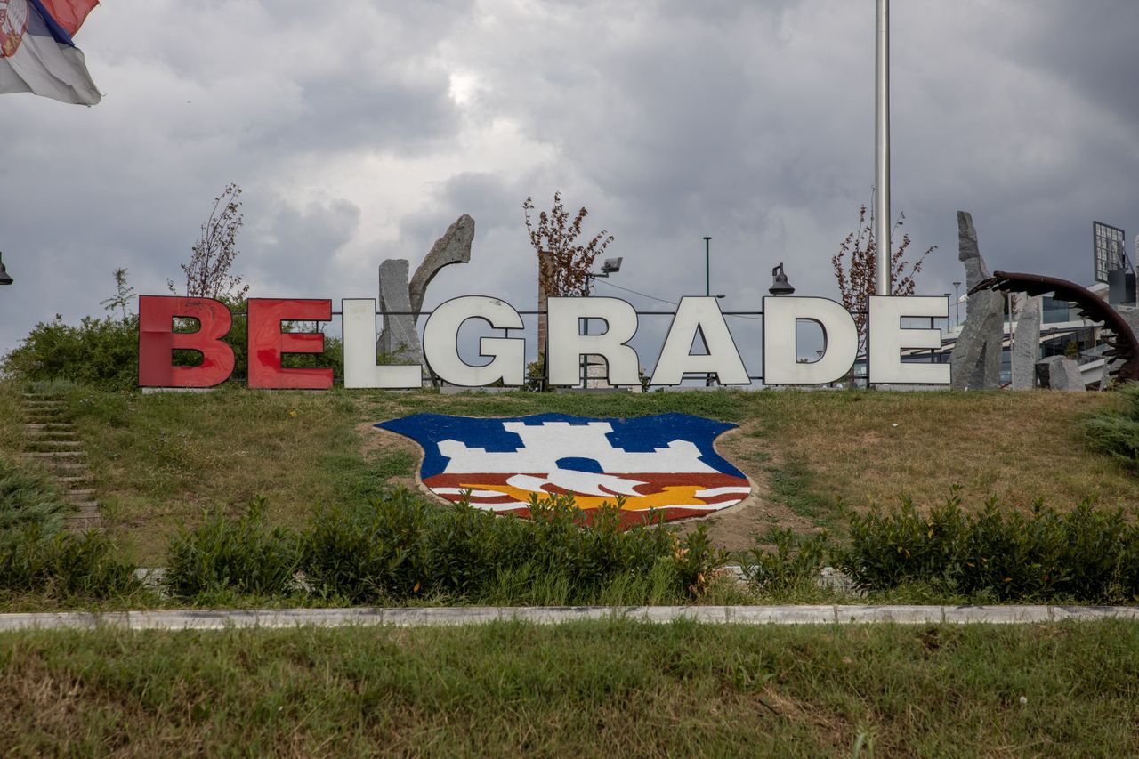 colorful belgrade sign with city emblem under an overcast sky symboliz