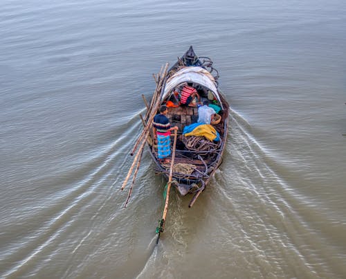 Fisherman Swimming on Boat