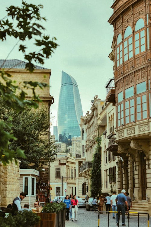 Flame Towers Skyscraper behind Street in Baku