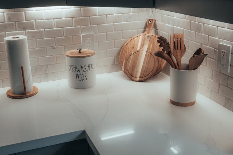 Kitchenware On Illuminated Kitchen Counter