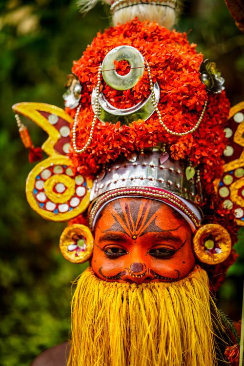 Free Portrait of a man in vibrant traditional Onapottan headdress during Onam festival celebration. Stock Photo