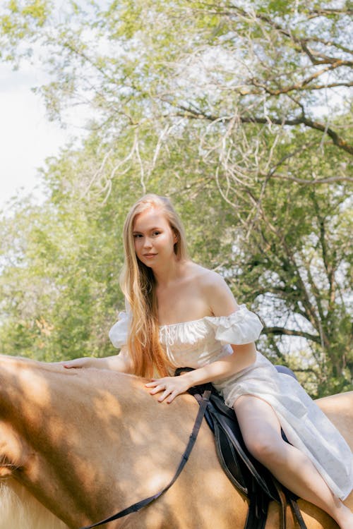Beautiful Woman Riding a Horse 
