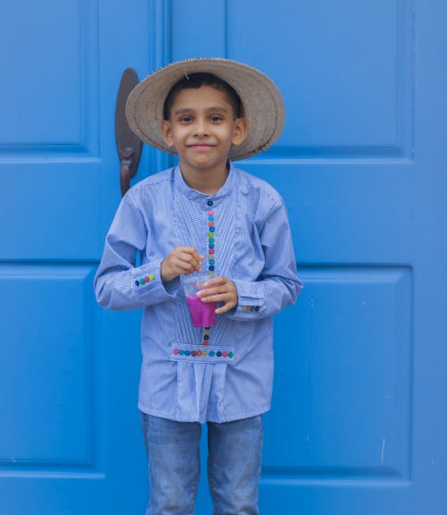 Boy Wearing a Straw Hat 