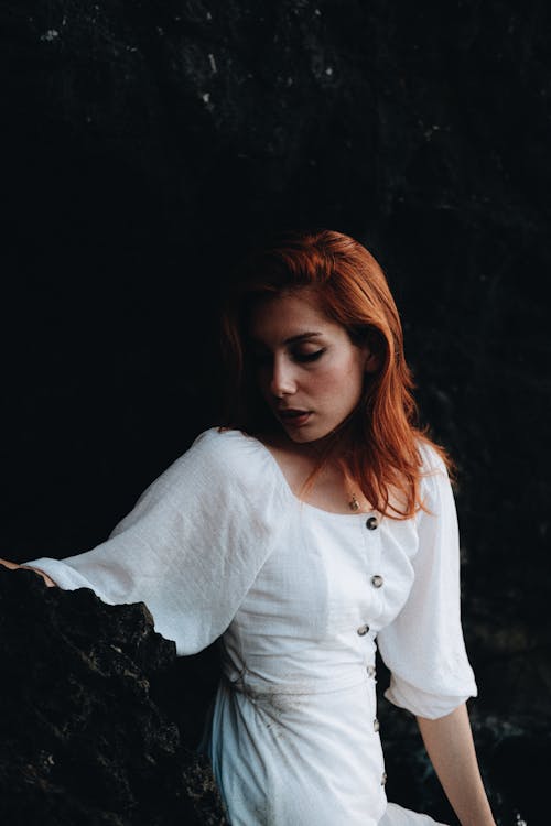Redhead Woman in White Clothes