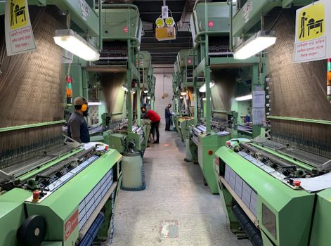 A modern textile factory in Dhaka representing the shift in Bangladesh apparel manufacturing.