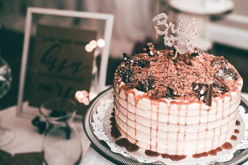 Free Vanilla Cake Topped With Chocolate And Syrup  Stock Photo