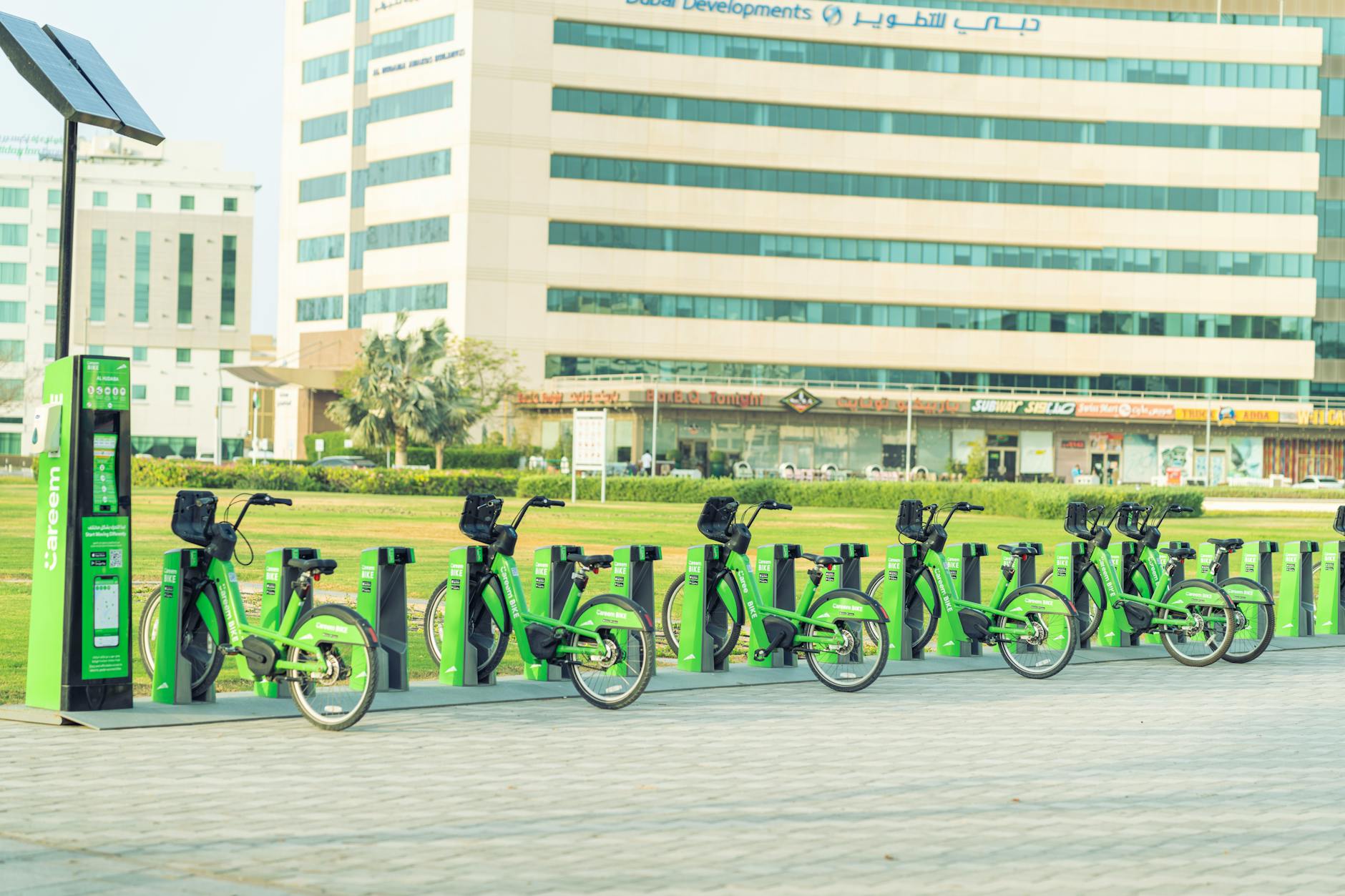 Green Careem bikes lined up in Dubai for eco-friendly urban transportation.
