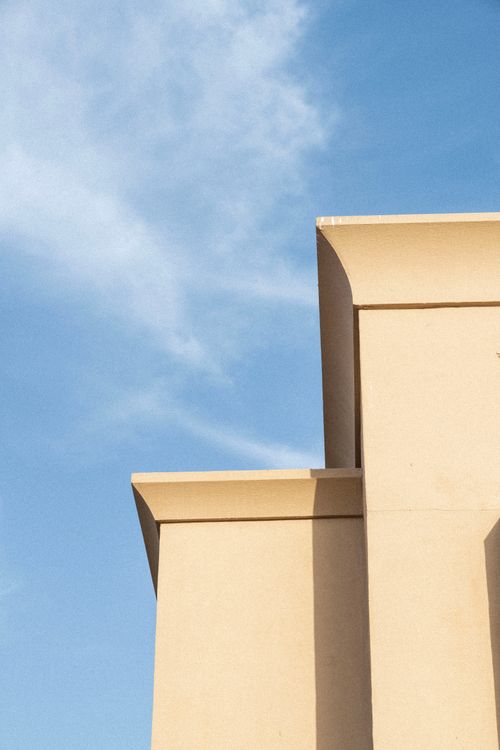 Free Modern structure with clean lines against a blue sky in Dubai, United Arab Emirates. Stock Photo