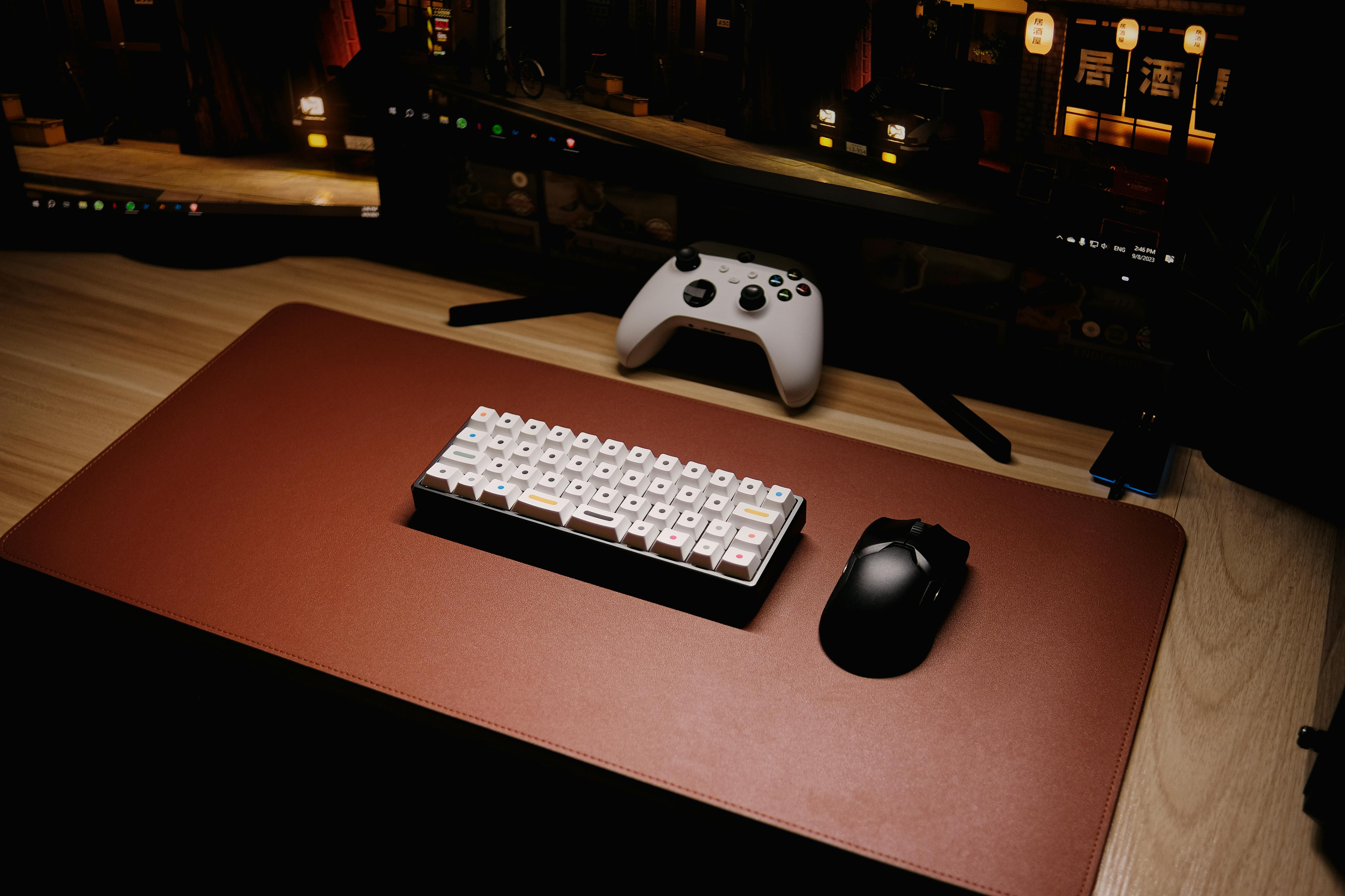 Keyboard and Controller near Monitors · Free Stock Photo