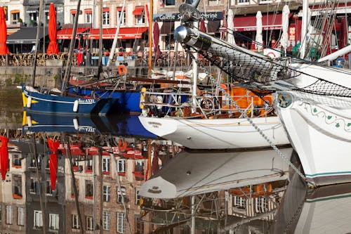 Sailboats Moored in Town