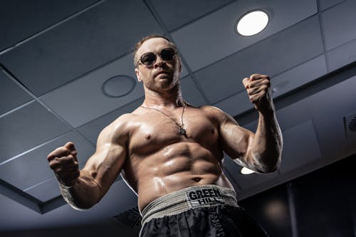 Topless Bodybuilder in Sunglasses