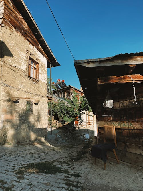 Abandoned Buildings by Street in Town