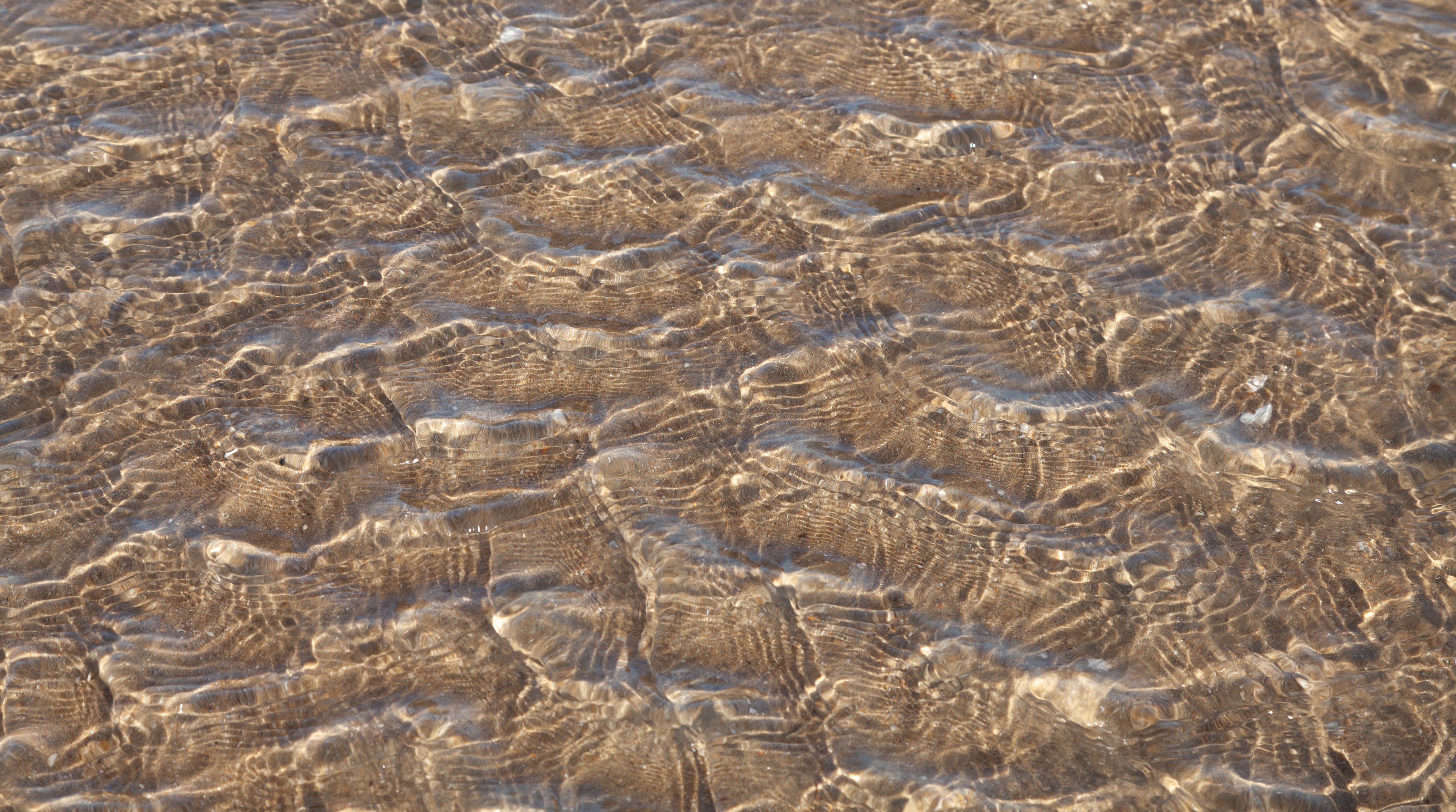 Shallow Water and Sand below · Free Stock Photo