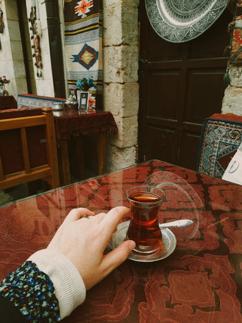Hand by Glass with Turkish Tea