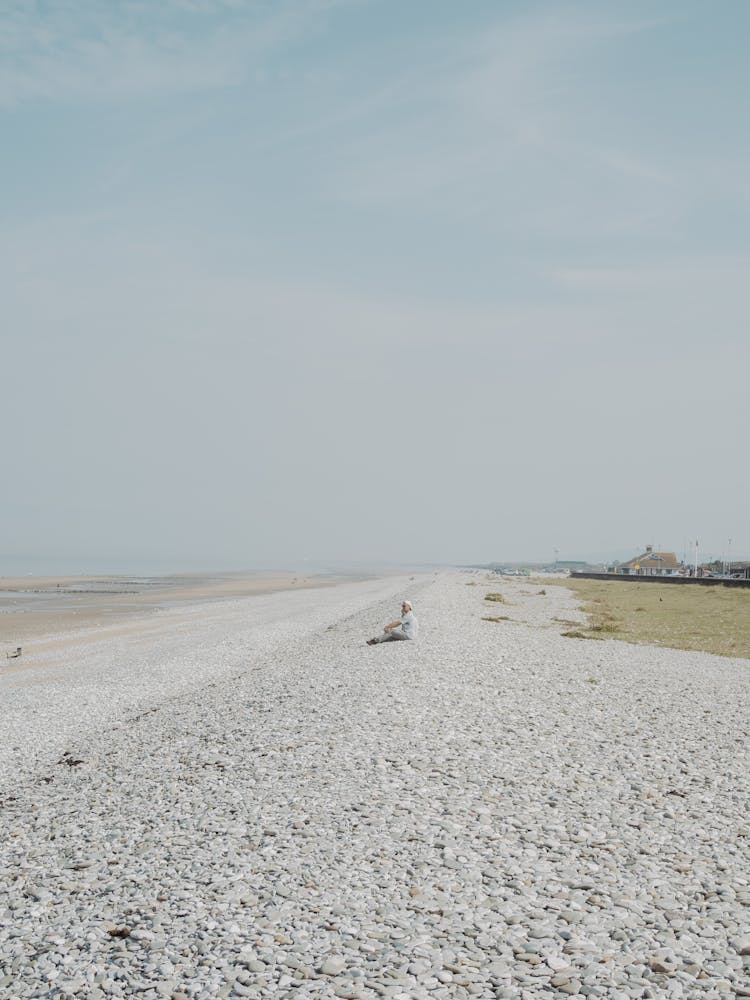 Person Relaxing At Beach