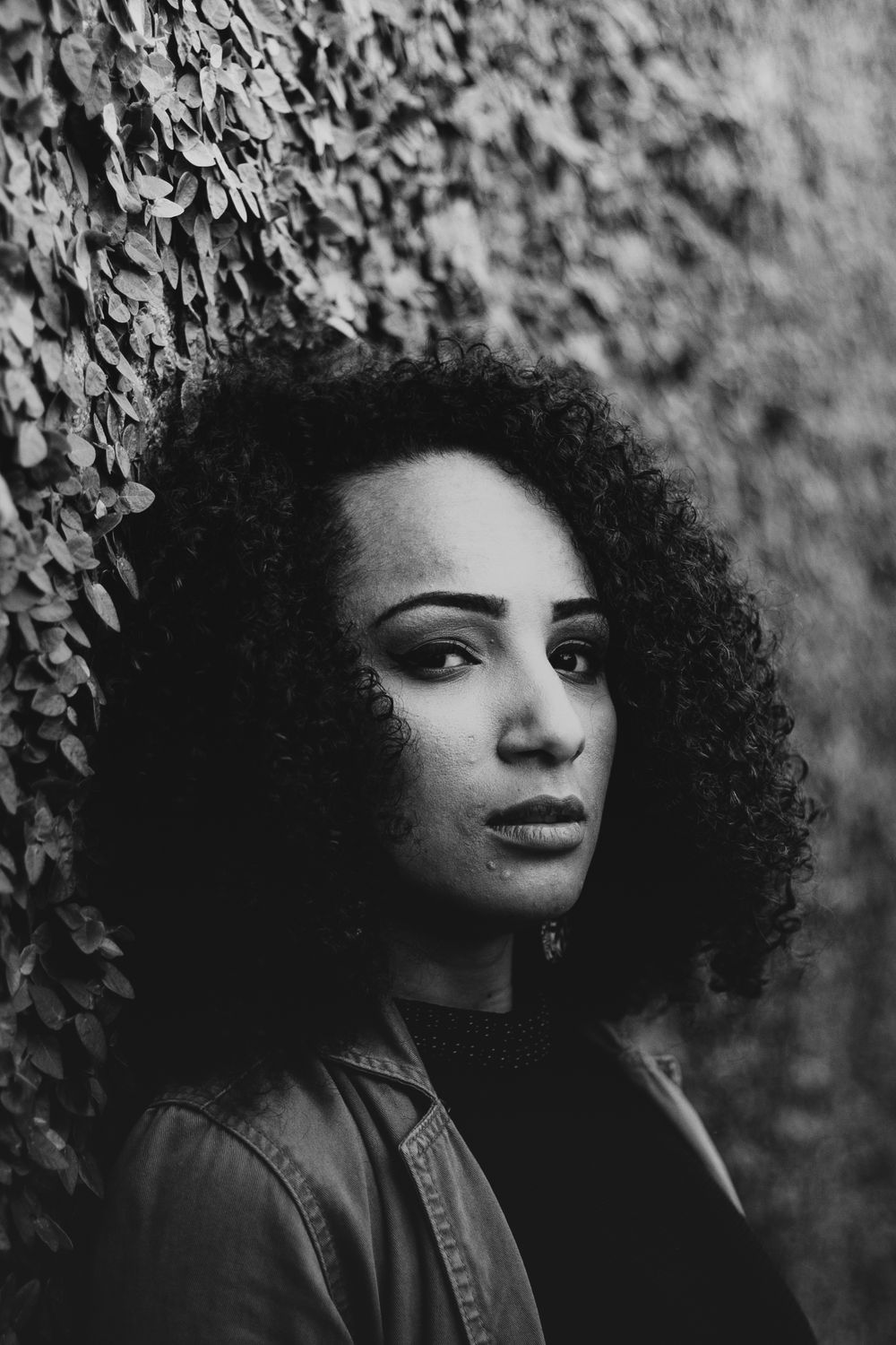 Woman With Curly Hair In Black And White Free Stock Photo woman-with-curly-hair-in-black-and-white-free-stock-photo