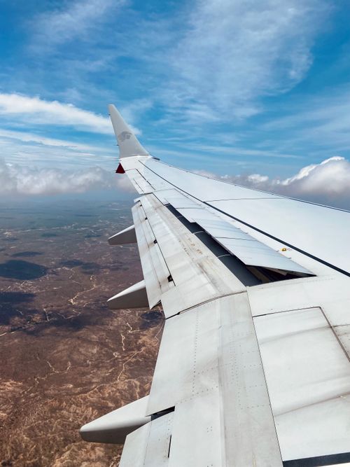 Free Scenic aerial view from an airplane over San José del Cabo, Mexico, showcasing the landscape. Stock Photo