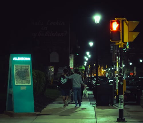 People Walking in Allentown at Night