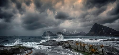Free Captivating view of stormy seas and rugged mountains in Storsandnes, Norway. Stock Photo