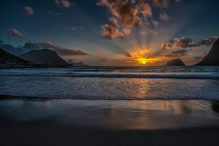 Calm Sea Shore At Sunset