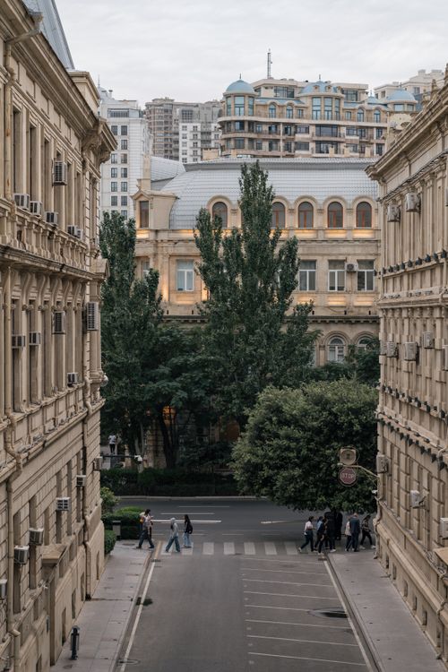 Free Charming view of a historic street in Baku, Azerbaijan, with classic architecture and city life. Stock Photo