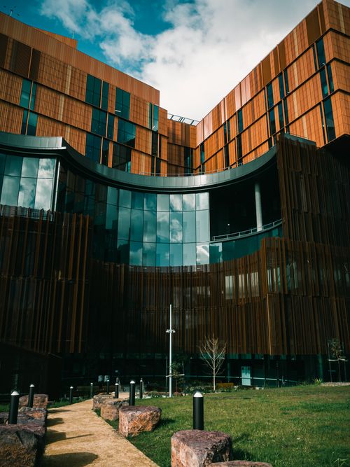 Free Vertical shot of a modern architectural facade in Melbourne, Australia. Stock Photo