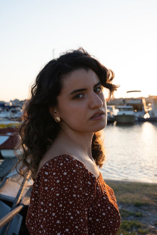 Serious Young Woman in a Summer Dress