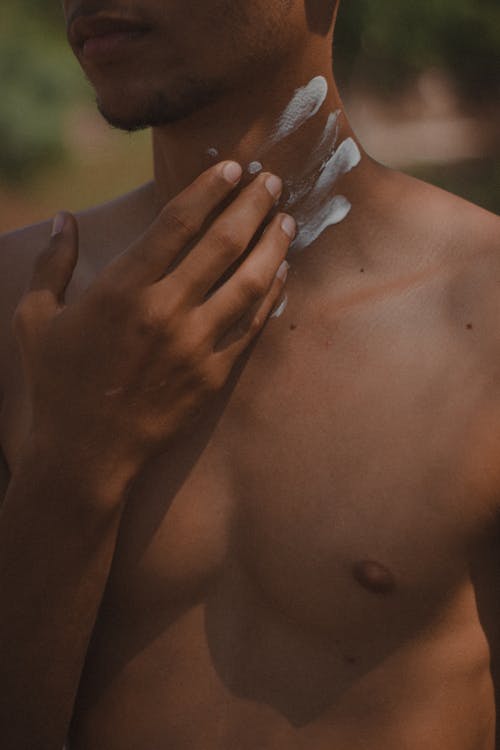 Topless Man with Paint on Hand