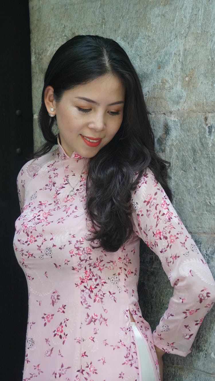 Woman In A Floral Patterned Blouse