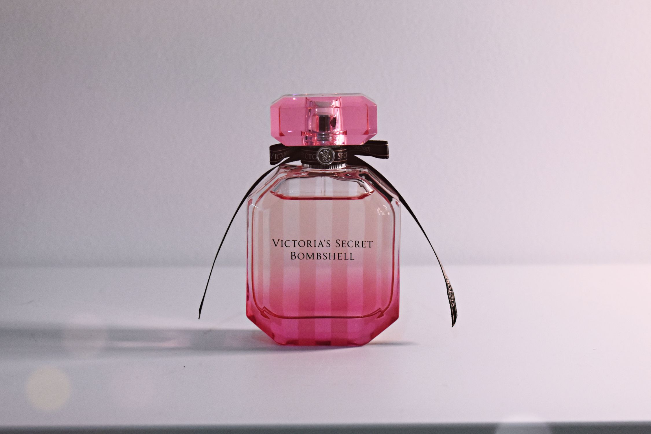 Victoria's Secret Bombshell Fragrance Bottle On White Surface · Free ...