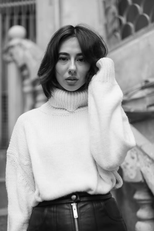 Black and White Picture of a Young Woman in a Sweater 