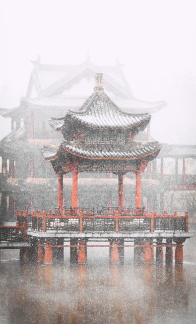 Beautiful Chinese architecture with a pagoda in rain, reflecting tranquil culture and tradition.