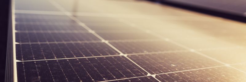 Close-up of solar panels harnessing renewable energy under the Austrian sun.