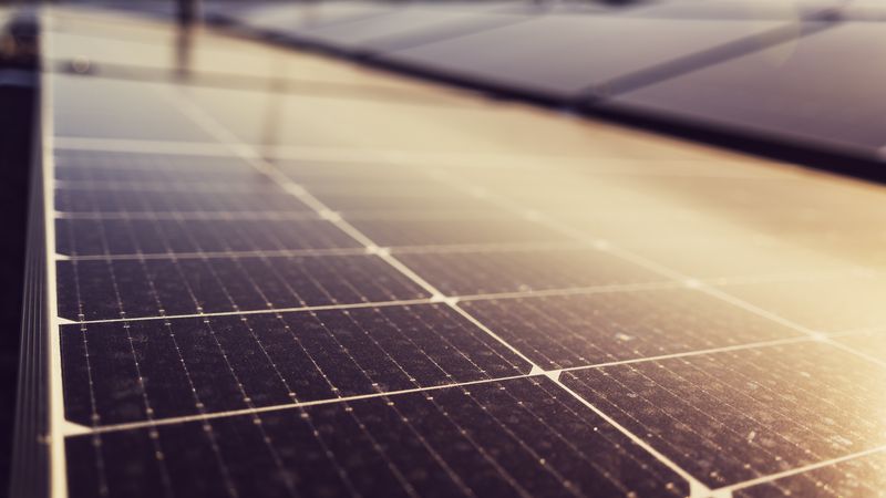 Close-up of solar panels harnessing renewable energy under the Austrian sun.