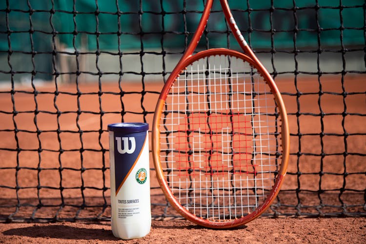 Tennis Racket, Net And Box