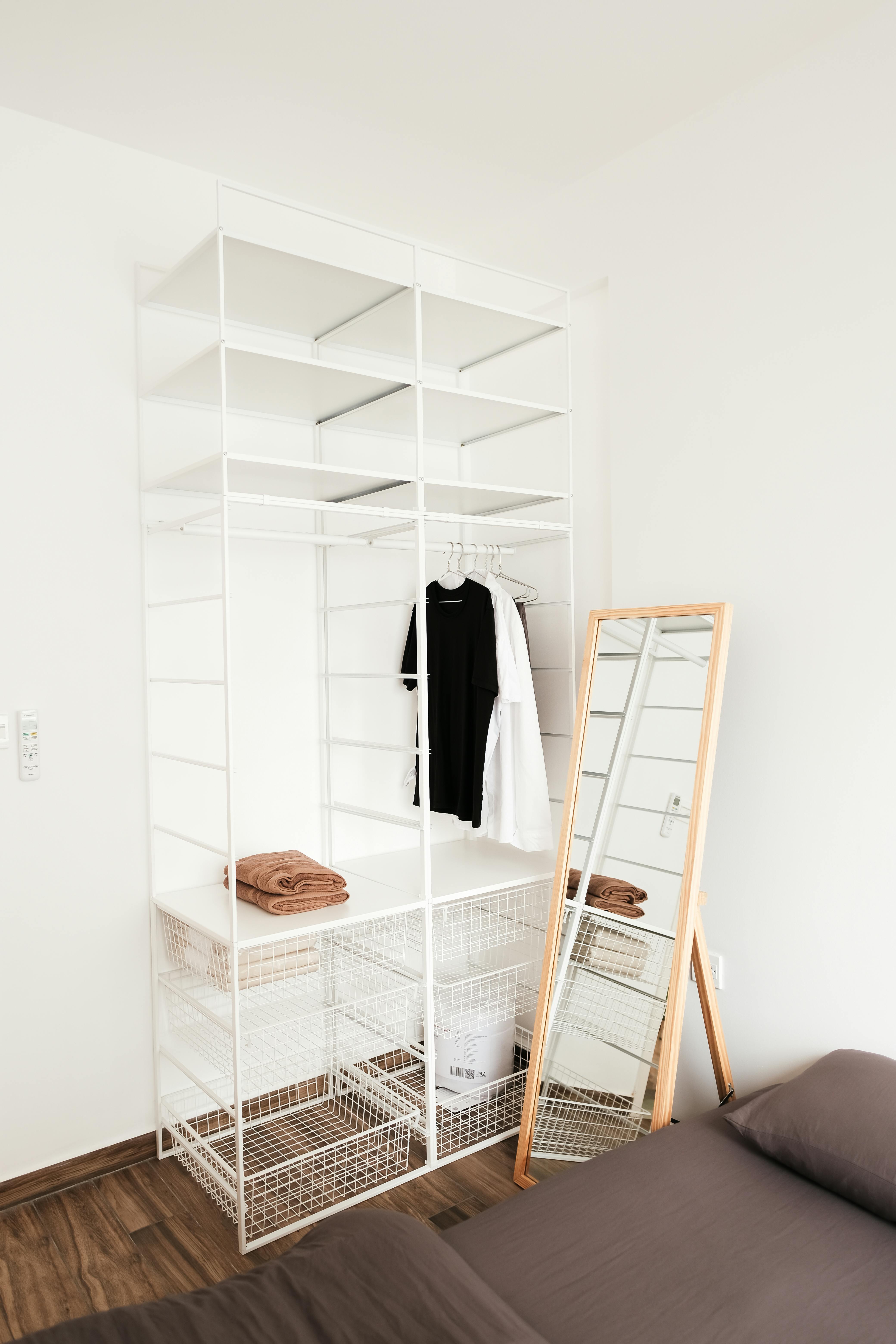 A Minimalist Open Wardrobe in a Room · Free Stock Photo