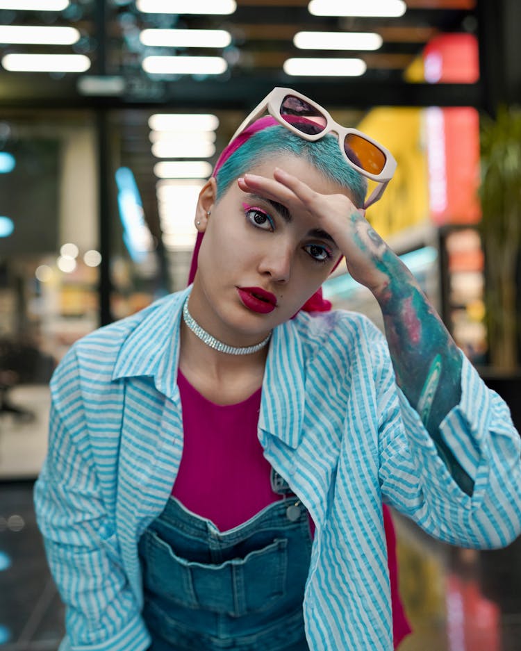 Model In Striped Blouse And Overalls