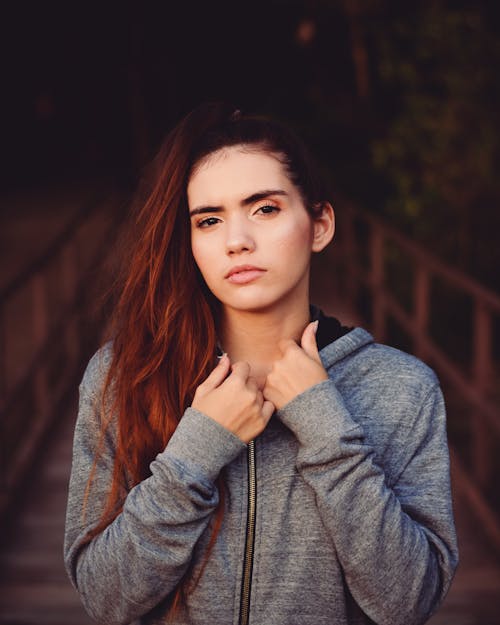 Woman Wearing Grey Zip-up Jacket 