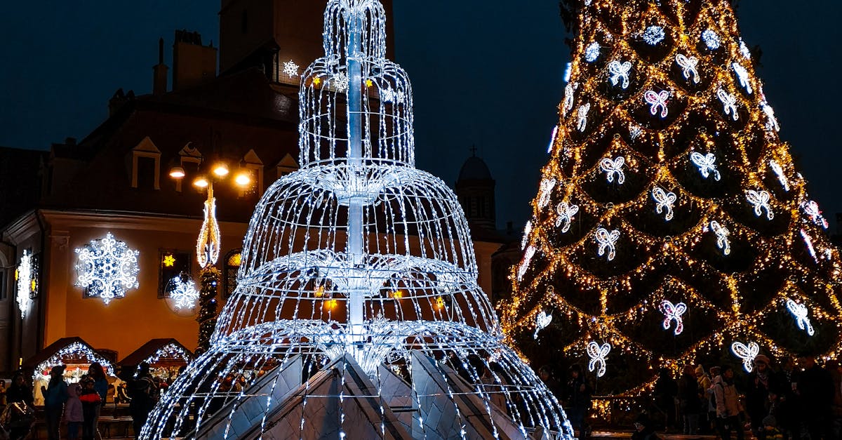 Diy water fountains: enchanting addition to your backyard Lighted Fountain Near Christmas Tree · Free Stock Photo