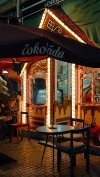 A beautifully illuminated café exterior at night in Istanbul, Türkiye.