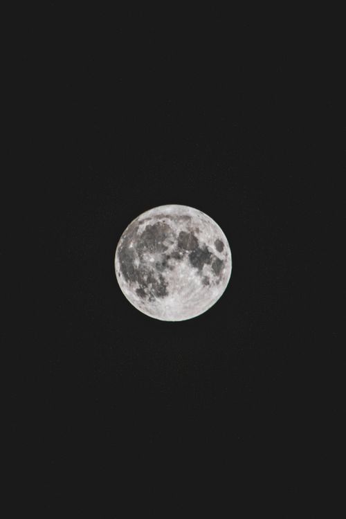 Free Stunning full moon against a dark night sky in Fülöpjakab, Hungary. Stock Photo