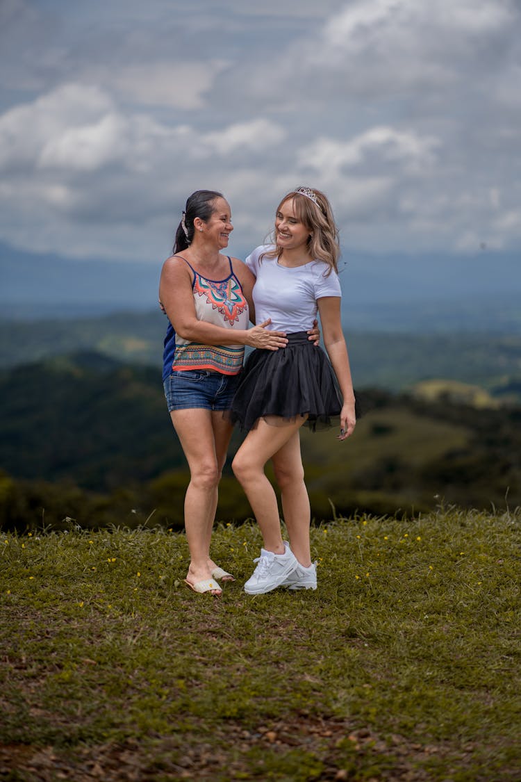 Mother With Daughter On Hill