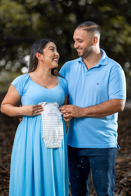 Couple Hold Baby Jumper