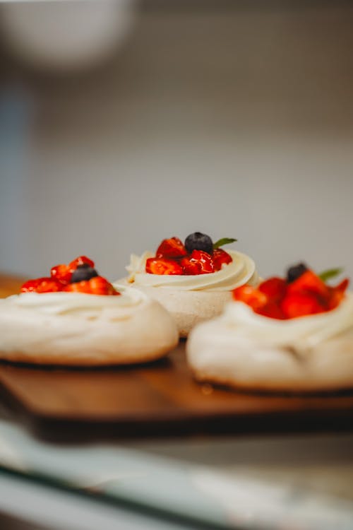 Cookies with Cherries and Blueberries on a Cutting Board