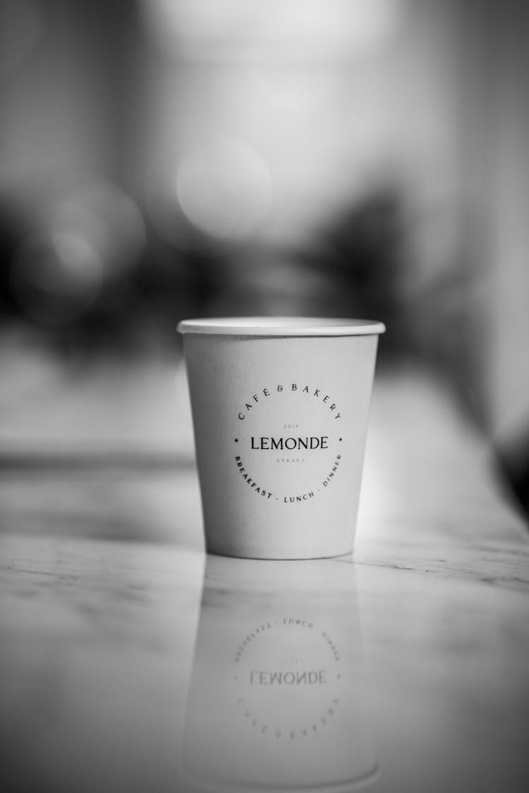 Disposable Cup On The Counter Of Lamonde Cafe And Bakery