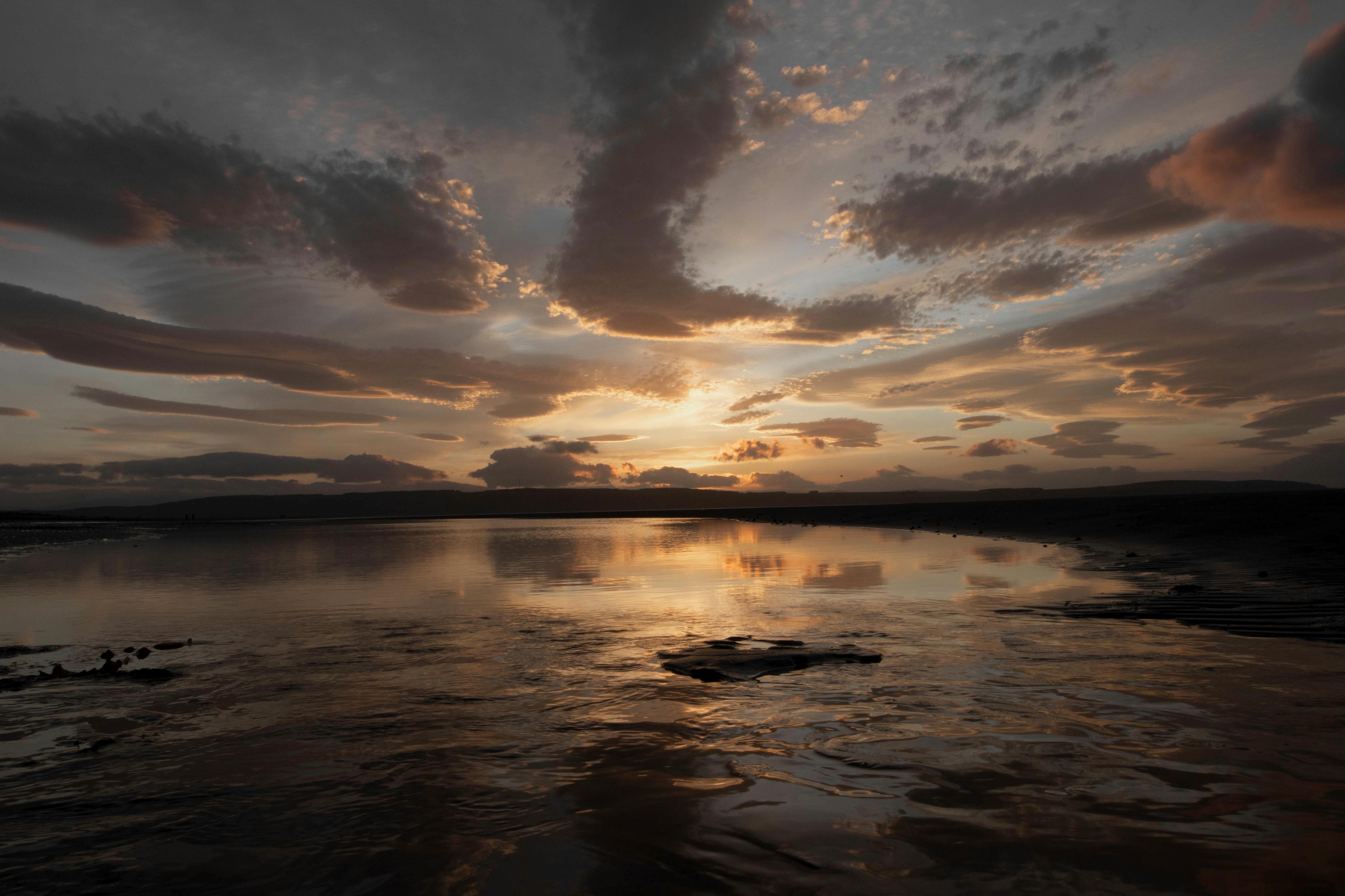 Dramatic Dawn over a Lake · Free Stock Photo