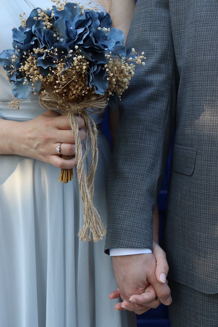 Bride And Groom Holding Hands